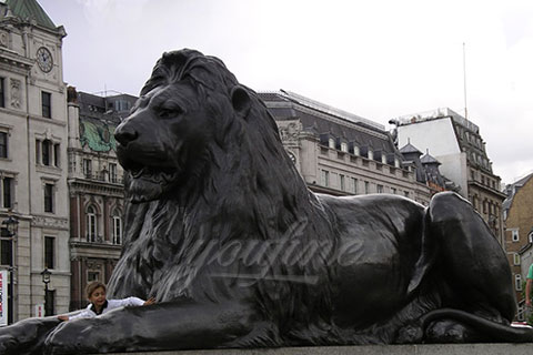 Garden lying life size bronze lion sculptures in park