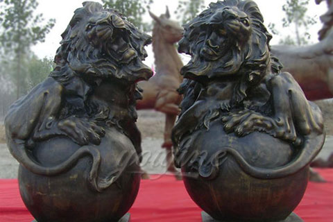 Large outdoor sculptures bronze lion statues with ball for sale