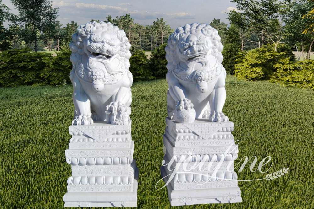 Marble foo dog statues pair Marble foo dog statues pair